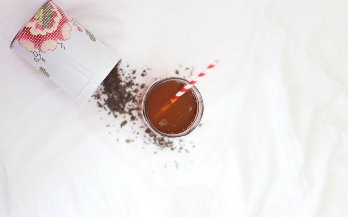 Chocolate spilled out of a jar with a chocolate drink