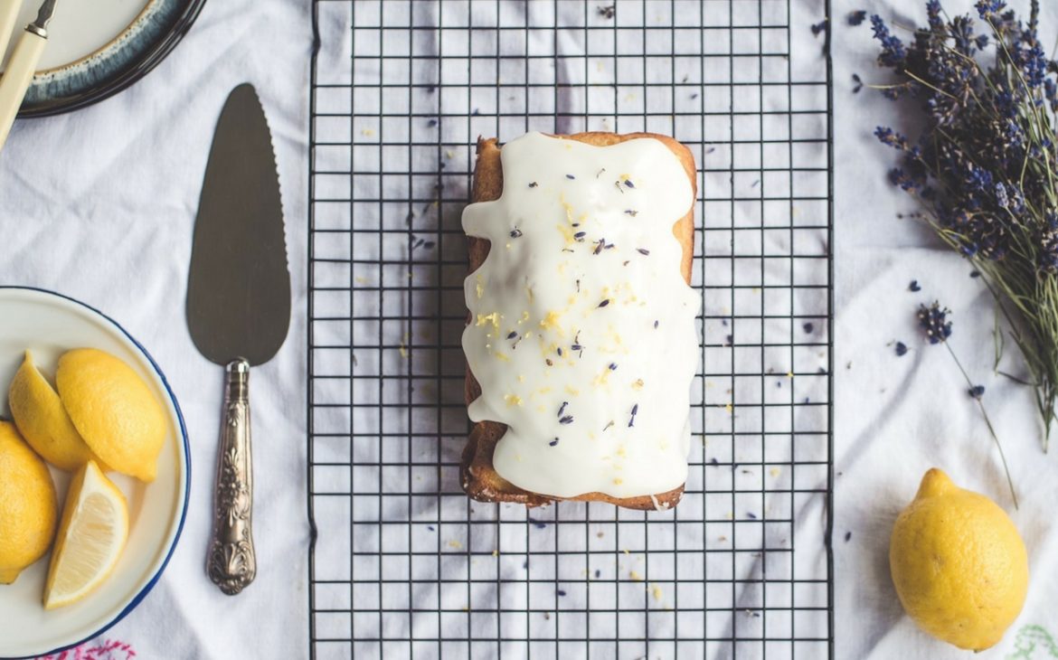Cake on a wire rack with a knife based on PMS Cravings