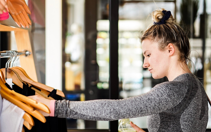woman choosing sustainable fashion for workout