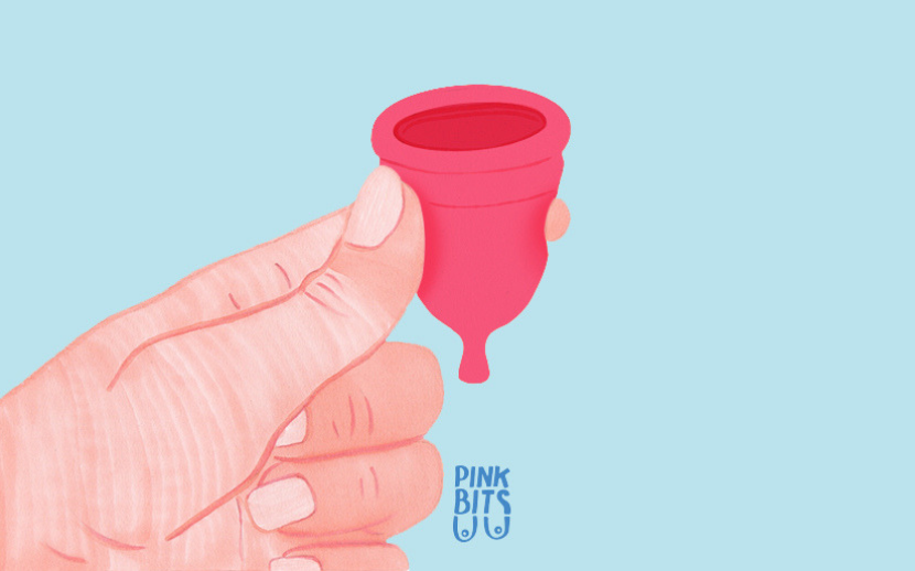 Illustration of hand holding TOTM reusable menstrual cup