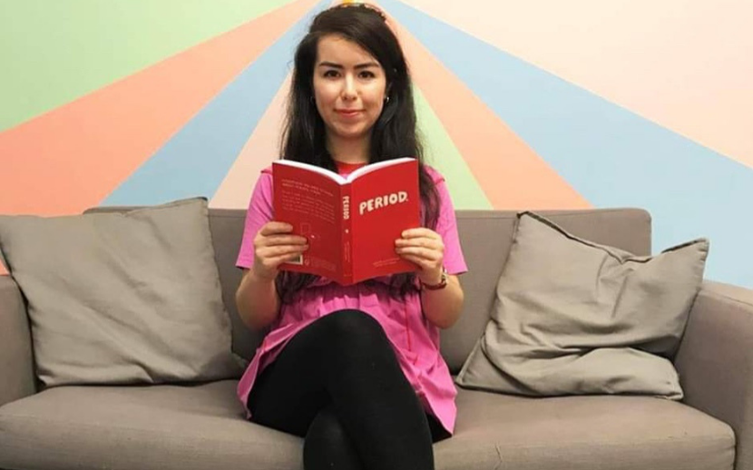 Author Natalie Byrne holding her book 'Period'