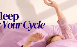 Woman in purple pyjamas stretching arms above head in bed. Text reads 'Sleep & Your Cycle'